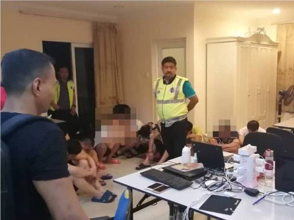 13 warga China ditahan dipercayai menjalankan judi secara online. - Foto: PDRM