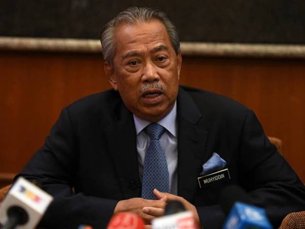 Menteri Dalam Negeri Tan Sri Muhyiddin Yassin bercakap pada sidang media Majlis Perhimpunan Bulanan Kementerian Dalam Negeri dan Amanat Tahun Baharu 2020 di Auditorium Kompleks D Kementerian Dalam Negeri hari ini. - Foto Bernama