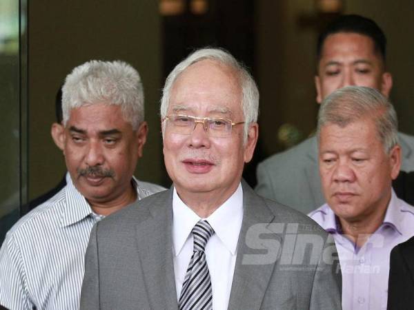 Najib berada di Mahkamah Tinggi Kuala Lumpur bagi perbicaraan kes SRC hari ini. FOTO: ZAHID IZZANI
