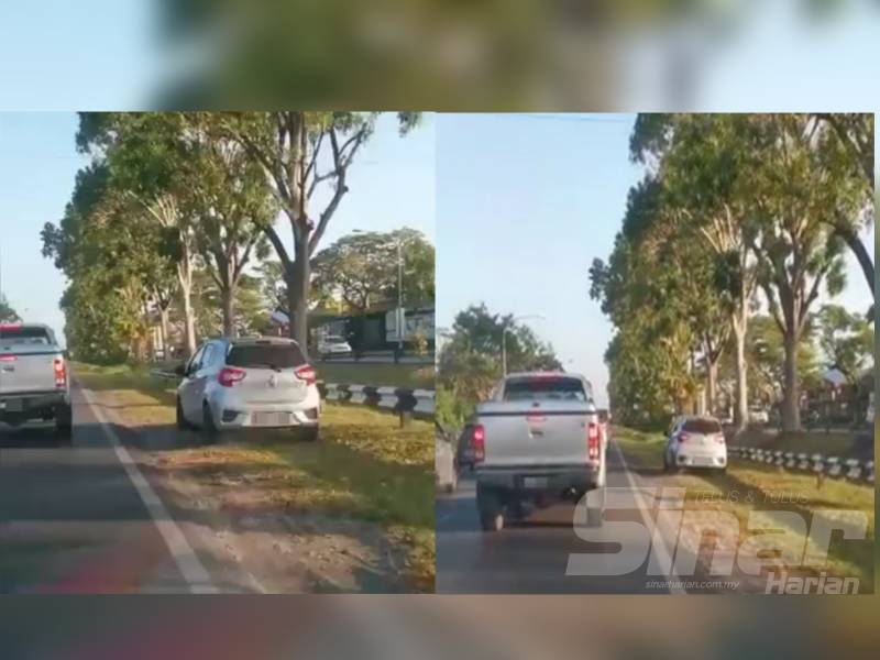 Tangkapan layar video yang memaparkan pemandu Perodua Myvi bertindak memandu kenderaannya di laluan berumput bagi mengelak kesesakan lalu lintas.