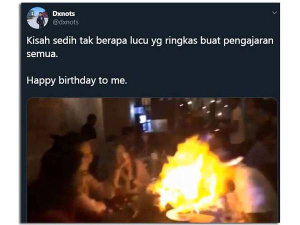 Paparan Twitter Dienul tular di laman sosial setelah memuat naik video insiden api menyambar rambutnya ketika meniup lilin.