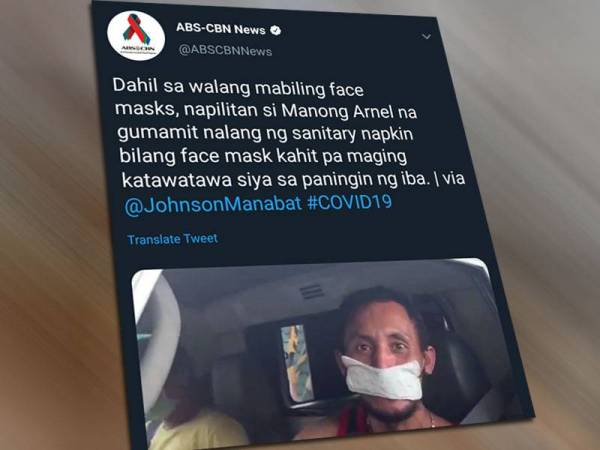 Paparan Twitter ABS-CBN News mendedahkan Arnel guna tuala wanita sebagai ganti penutup muka tular di laman sosial.