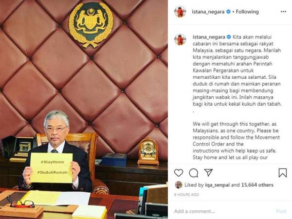 Gambar Al-Sultan Abdullah memegang plakad kuning memaparkan tulisan #StayHome dan #DudukRumah yang dimuat naik di Instagram rasmi Istana Negara.