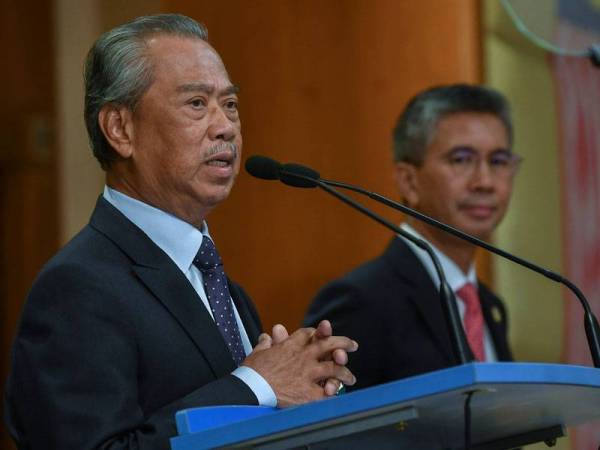 Muhyiddin semasa sidang media khas selepas mempengerusikan mesyuarat kedua Majlis Tindakan Ekonomi di Bangunan Perdana Putra hari ini.
Turut hadir Menteri Kewangan Tengku Datuk Seri Zafrul Tengku Abdul Aziz. Foto: Bernama