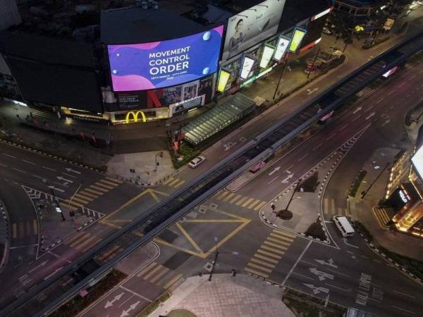 Bukit Bintang, lengang dan sunyi seperti sebuah bandar yang ditinggalkan menjadikan ia satu pemandangan yang jarang-jarang berlaku dalam sejarah negara. - Foto Bernama