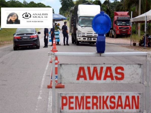 Anggota polis bersama tentera dan Rela terus melakukan sekatan jalan raya untuk memeriksa kenderaan yang melalui jalan utama di Felda Mempaga, Bentong semalam. - Foto Bernama