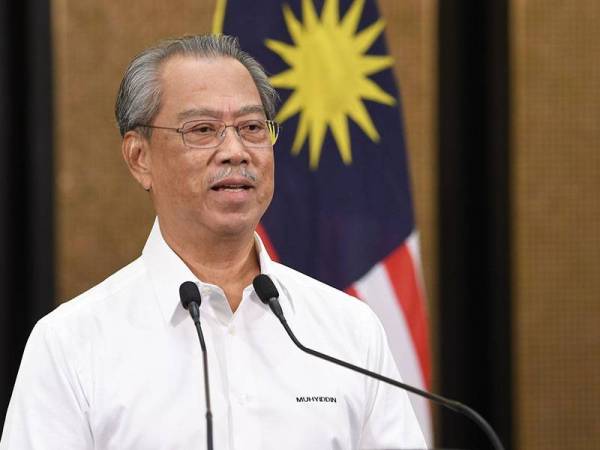 Perdana Menteri Tan Sri Muhyiddin Yassin ketika menyampaikan Perutusan Khas sempena Hari Pekerja di Bangunan Perdana Putra hari ini. - Foto Bernama