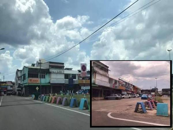 Walaupun kerajaan telah mengumumkan PKPB, aktiviti membeli-belah di pekan itu masih sunyi.. FOTO: Pembaca