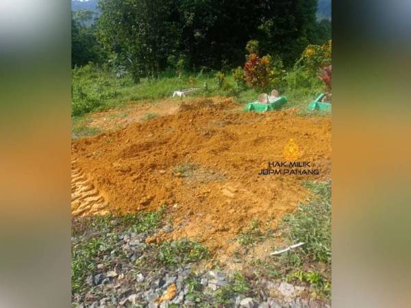 Lokasi kejadian mangsa tertimbus tanah ketika menggali kubur. FOTO JBPM PAHANG