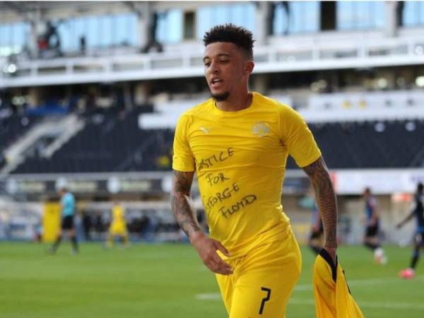 Tulisan ‘Keadilan buat George Floyd’ tertera pada jersi Sancho aksi ketika menentang Paderborn dalam saingan Bundesliga di Benteler Arena awal pagi semalam.