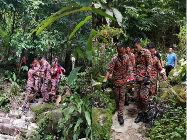 Mangsa dibawa turun dengan pengusung oleh bomba tadi.