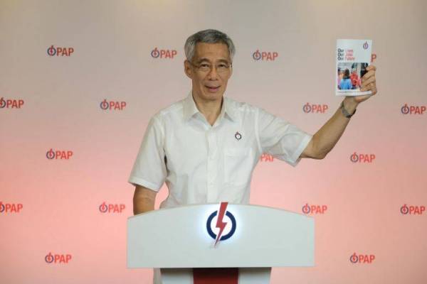 Hsien Loong mengumumkan manifesto PAP, hari ini. - Foto: Agensi