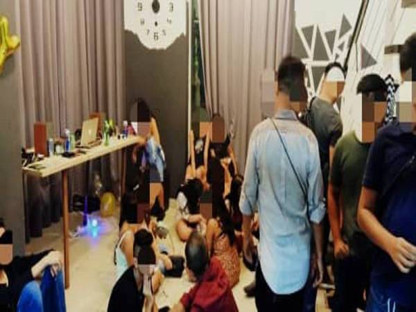 Antara individu yang ditahan dalam Op Wild Party di sebuah kondominium Jalan Klang Lama di sini semalam.