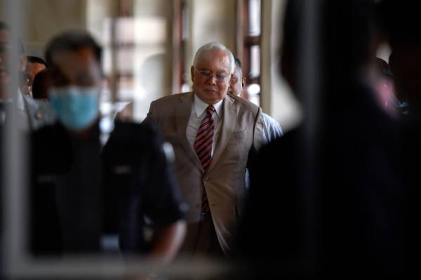 Najib didapati bersalah terhadap ketujuh-tujuh pertuduhan melibatkan pecah amanah jenayah (CBT), pengubahan wang haram dan menyalahgunakan kuasa melibatkan RM42 juta dana SRC International Sdn Bhd. -Foto Bernama