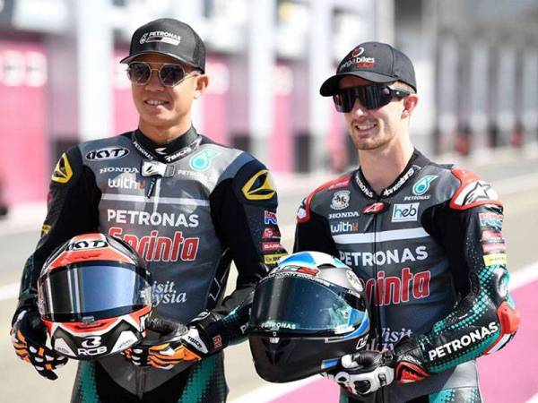 Khairul Idham (kiri) gagal memberikan impak dalam saingan Moto3 setakat ini.