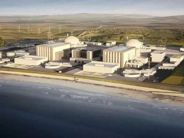 Gambar janaan komputer menunjukkan loji tenaga nuklear di Hinkley Point, barat daya England yang dijangka siap pada tahun 2025. - Foto AFP