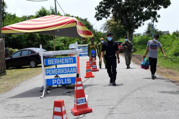 PKPD Pentadbiran di dua buah kampung di Perlis dan empat mukim di Kedah ditamatkan lebih awal selepas tiada kes positif baharu dikesan. - Foto Bernama