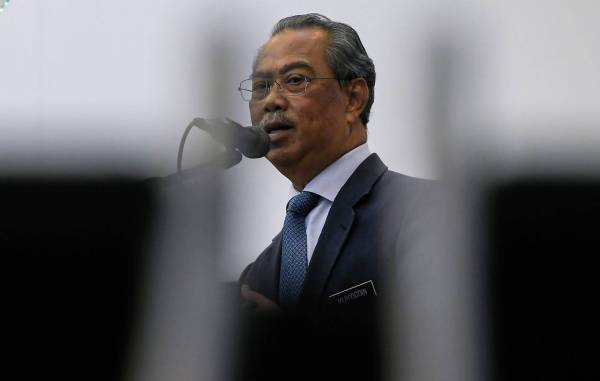 Perdana Menteri, Tan Sri Muhyiddin Yassin berucap pada Konyensyen Setengah Tahun Pentadbiran Perikatan Nasional (PN) di Persatuan Alumni Universiti Malaya (PAUM) hari ini. - Foto Bernama