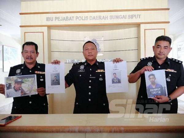 Mohd Khaizam (tengah) pada sidang akhbar di IPD Sungai Siput hari ini.