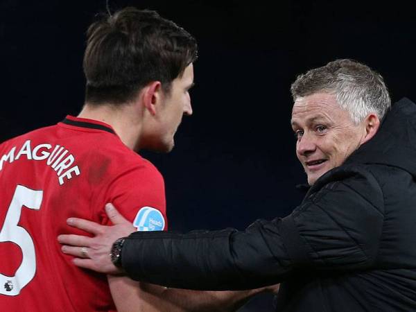 Solskjaer (kanan) yakin Maguire mampu hentikan ketajaman Kane.