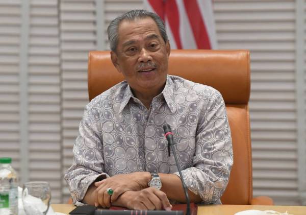 Muhyiddin ketika mempengerusikan mesyuarat khas Majlis Keselamatan Negara berkenaan Covid-19 di bangunan Perdana Putra, Putrajaya hari ini.