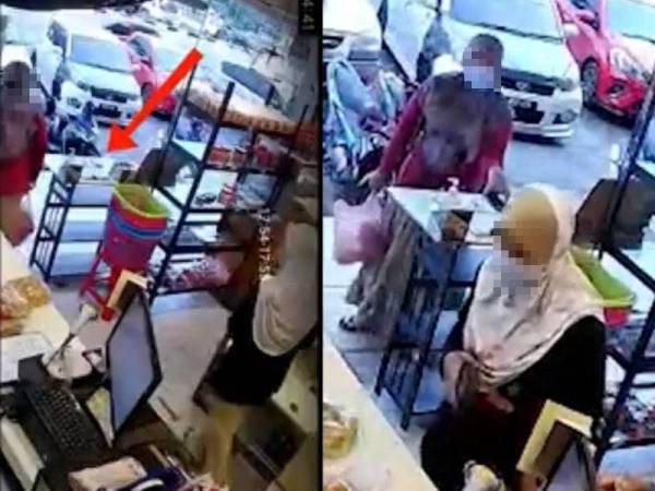 Rakaman CCTV yang memaparkan pelaku memegang sebuah telefon bimbit milik mangsa, Siti Suhaila yang tertinggal di meja saringan suhu badan di pintu masuk kedai roti di Kubang Kerian, semalam.