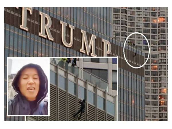 Lelaki tersebut tergantung pada balkoni tingkat 16 Trump Tower selama lebih 13 jam. - Foto Agensi