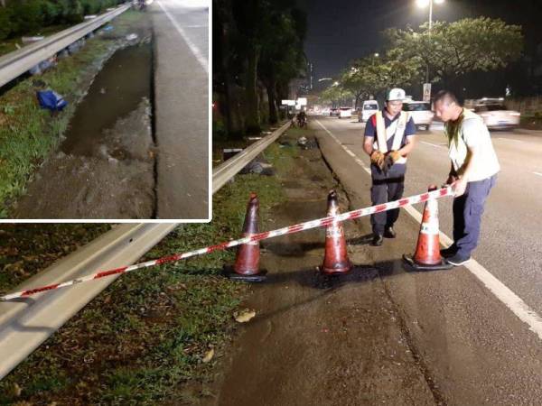 Pita keselamatan dipasang di kawasan lopak air yang menyebabkan seorang anggota TUDM maut semalam sebagai tanda amaran kepada pengguna jalan lain.