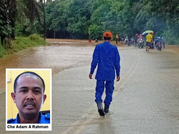 Pasukan APM melakukan pemantuan situasi banjir di Hulu Terengganu. - Foto APM