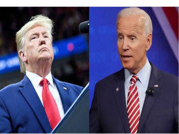 Bekas Naib Presiden Amerika Syarikat, Joe Biden (kanan) disahkan oleh Kolej Elektoral memenangi pilihan raya Presiden negara itu dengan menewaskan Presiden Donald Trump. - Foto AFP