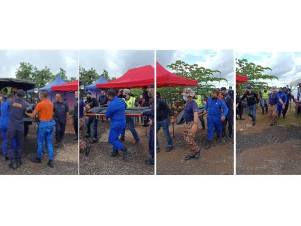 Anggota bomba mengangkat mayat seorang lelaki yang ditemukan di perairan Kampung Tanjung Langsat, Pasir Gudang, hari ini.