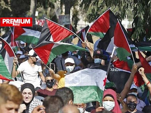 Penduduk Palestin di Ramallah pernah memprotes keputusan Emiriah Arab Bersatu untuk menormalkan hubungan dengan Israel pada Ogos lalu. - Foto AFP