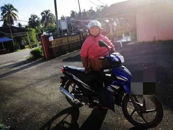 Rohaizan nekad menunggang motosikal seorang diri dari Kampung Kemahang,Benta ke HTAA pada Rabu.