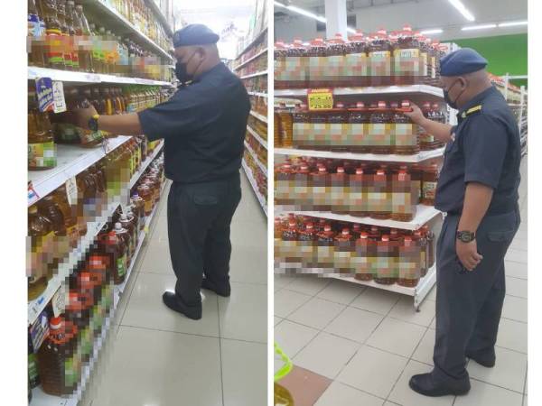 Pegawai Penguatkuasa KPDNHEP membuat pemeriksaan harga minyak masak. - Foto Ihsan KPDNHEP