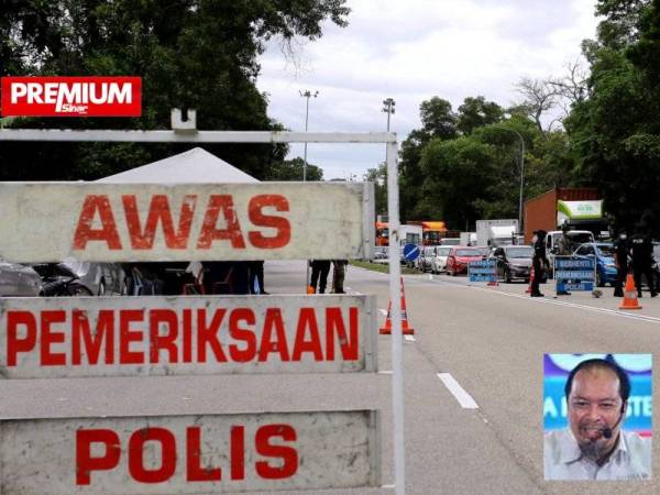 Sekatan jalan raya bagi memantau kenderaan yang melakukan rentas tanpa kebenaran. -Foto Bernama