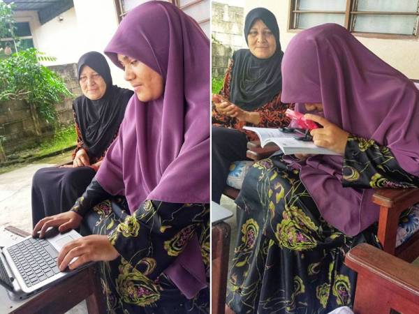 Normawati (kiri) melihat anaknya mengulang kaji pelajaran menggunakan 'electronic magnifier' di rumah mereka di Kampung Bohor, Hutan Kampung, Alor Setar pada Jumaat.