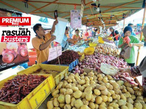 Amalan meminta rasuah daripada golongan peniaga kecil dengan menggunakan broker perlu dihentikan kerana perbuatan itu menganiaya golongan berkenaan. - Gambar hiasan