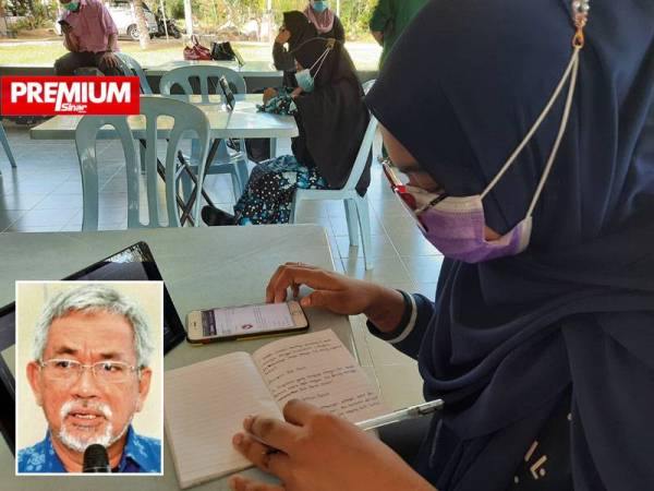 Tengku Nur Alia sedang mengikuti pembelajaran PdPR di Dewan PAWE, Balik Pulau pada Jumaat. Gambar kecil: Mohamad Ali Hasan