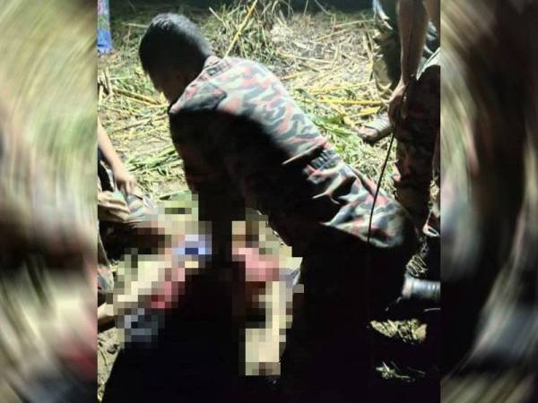 Seorang kanak-kanak perempuan maut dipercayai akibat lemas dalam sungai di Kampung Pendek di sini lewat petang Isnin. -Foto ihsan bomba