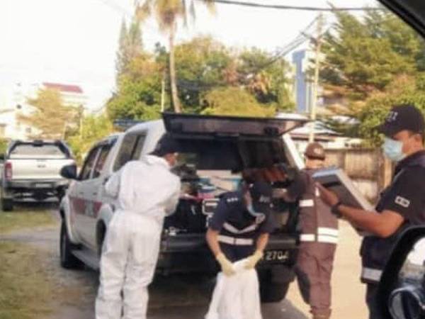 Anggota polis sedang melakukan persiapan sebelum menjalankan siasatan terperinci di lokasi kejadian pada pagi Rabu -Foto: Ihsan pembaca