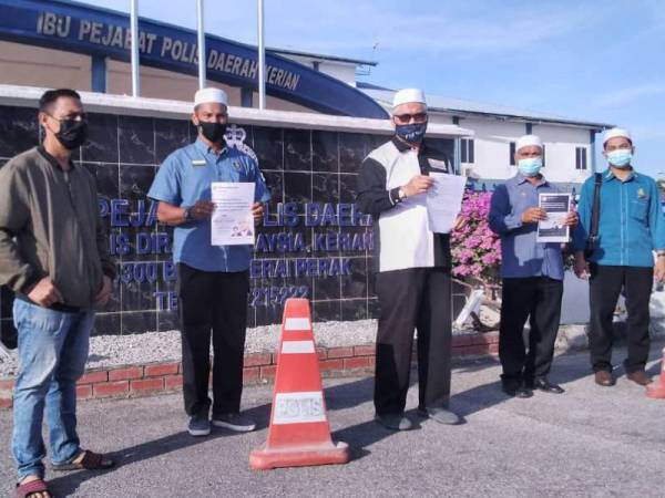 Razman (tengah) ditemui selepas membuat laporan polis di IPD Kerian pada Isnin.