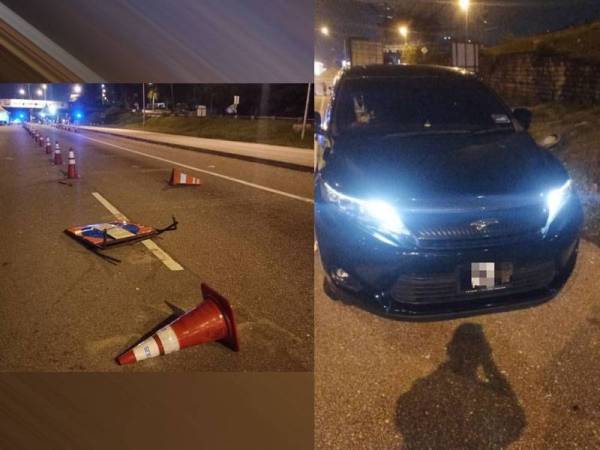 Sebuah kereta jenis Toyota Harrier yang dipandu wanita ditahan dan beberapa peralatan di sekatan jalan raya yang rosak selepas dilanggar pemandu wanita di Tol Damansara, Petaling Jaya, pada Selasa. 