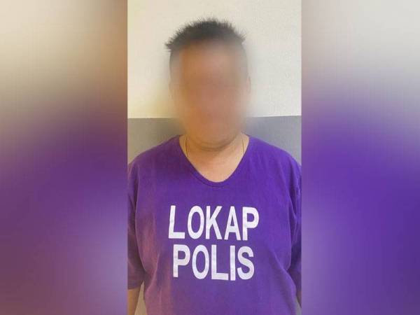 Lelaki yang ditahan polis selepas berang ditegur tidak memakai pelitup muka di Sitiawan. - Foto Ihsan PDRM