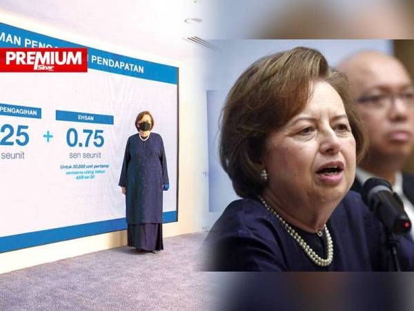 Zeti ketika mengumumkan pengagihan pendapatan dana unit ASB di Menara PNB, Kuala Lumpur pada Disember lalu.