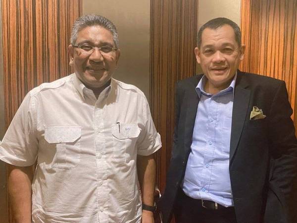 Hamidin (kanan) bersama bersama Megat Zulkarnain.