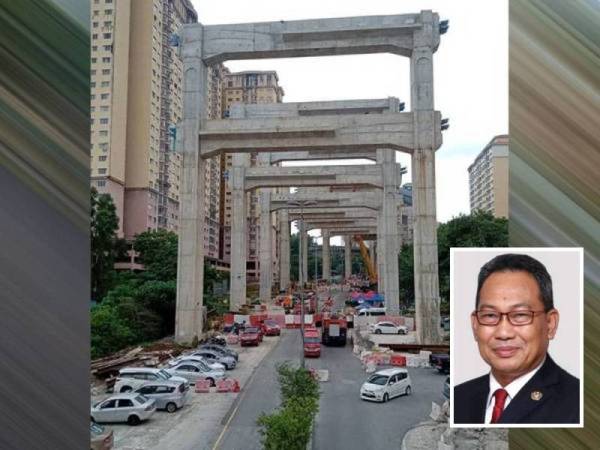 Lokasi kejadian struktur besi kren 'launcher' terjatuh di tapak pembinaan Lebuhraya Bertingkat Sungai Besi-Ulu Kelang (SUKE) berhampiran Puncak Banyan, Persiaran Alam Damai, Cheras. Gambar kecil: Awang Hashim