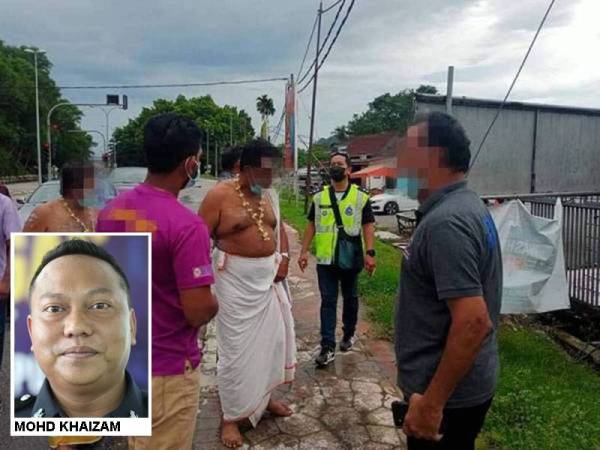 Gambar tular beberapa individu yang melakukan provokasi berang apabila perarakan kenderaan ditahan polis di Sungai Siput pada Khamis lalu. Foto: Ihsan Pembaca.