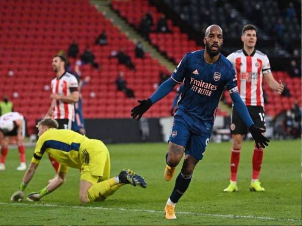 Gaya Lacazette selepas menjaringkan gol pembukaan Arsenal ketika bertandang ke Bramall Lane menentang Sheffield United. - Foto AFP