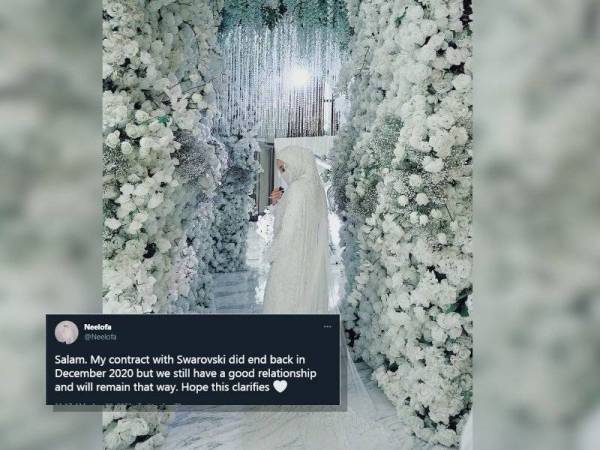 Busana nikah Neelofa diserikan dengan 5,000 butir baju kristal Swarovski. (Kenyataan Neelofa di Twitter.)