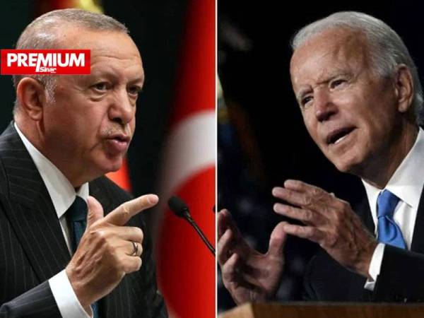 Presiden Turki, Recep Tayyip Erdogan (kiri) kini berbalah dengan Presiden Amerika Syarikat, Joe Biden berhubung isu pembunuhan etnik Armenia ketika era pemerintahan empayar Uthmaniyah. - AFP